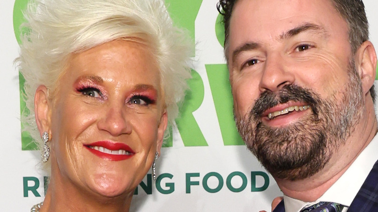 Anne Burrell and Stuart Claxton smiling