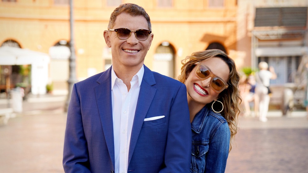 Bobby Flay and Giada De Laurentiis smiling in Rome