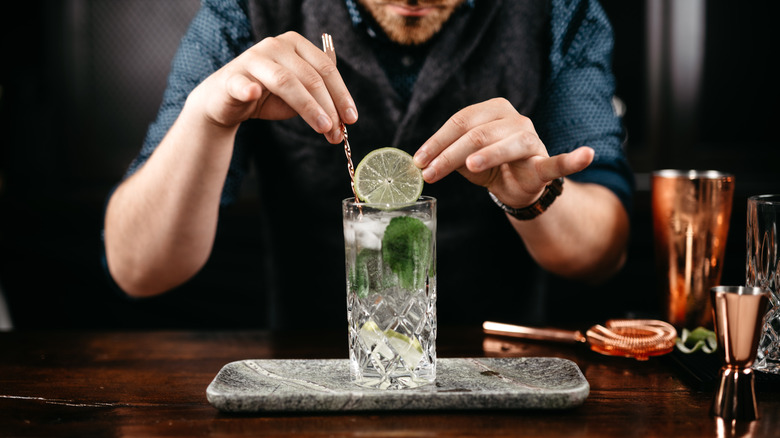 Bartender preparing a mixology cocktail