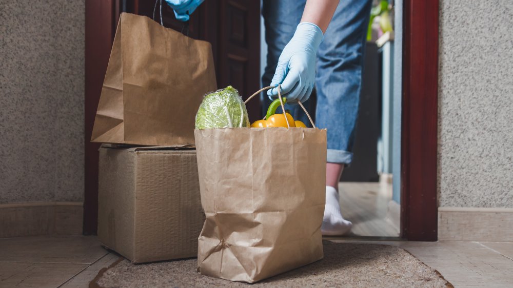 Woman carrying box