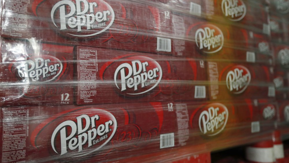 Boxes of Dr Pepper wrapped in cellophane
