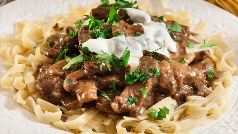 beef stroganoff over egg noodles