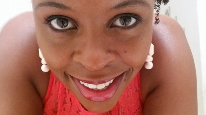 Naomi Mwangi wearing earrings