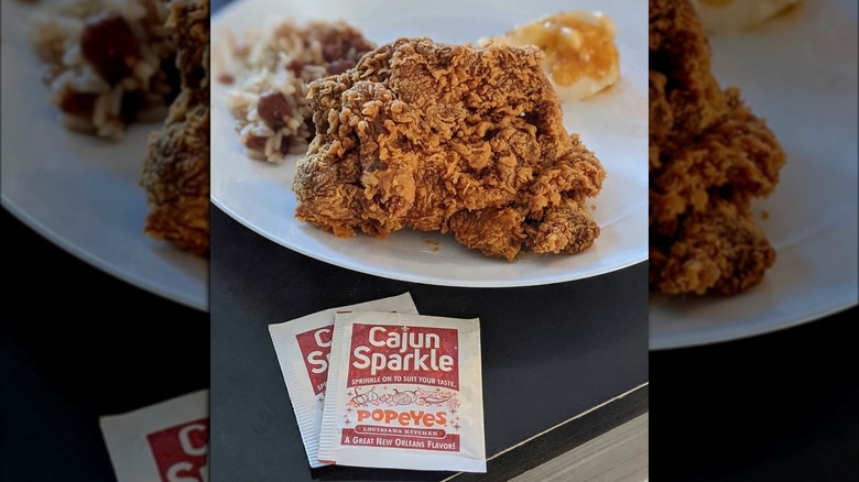 Popeyes chicken and Cajun Sparkle packet