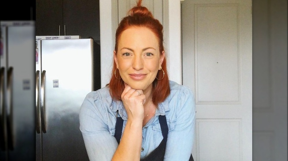 Sasha Grumman sporting hoop earrings