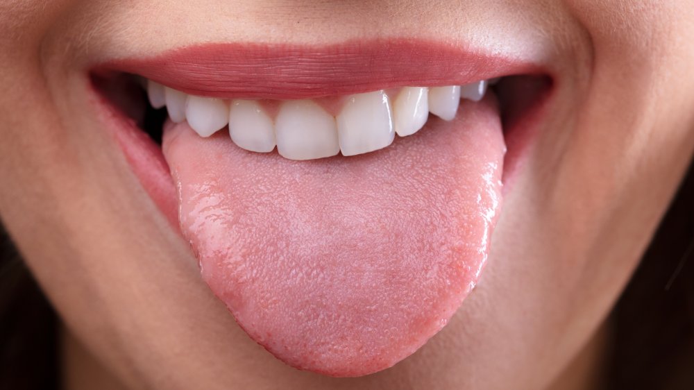 Woman sticking out tongue