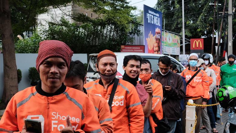 Drivers lining up for BTS meals outside McDonalds Indonesia