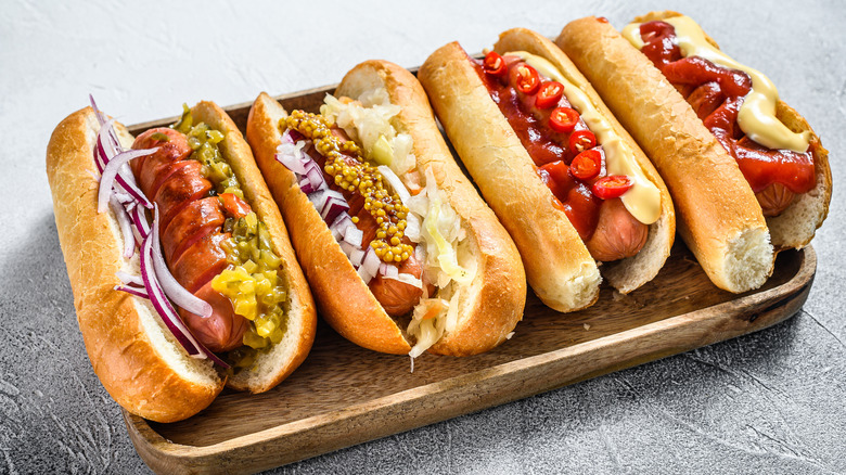 Hot dogs with a variety of toppings.