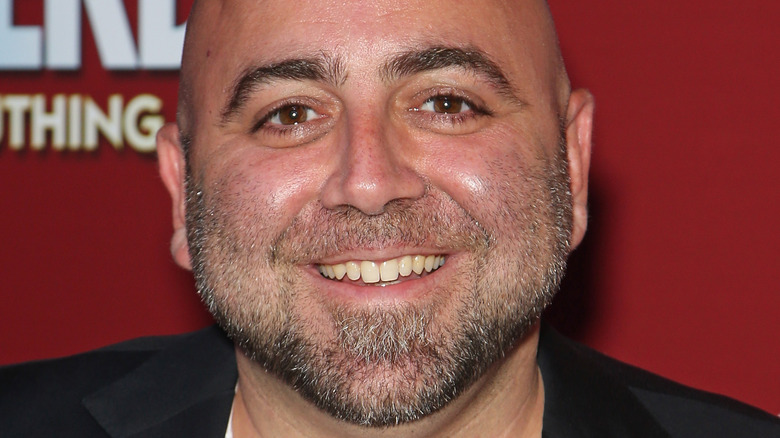 Duff Goldman smiling and wearing blazer