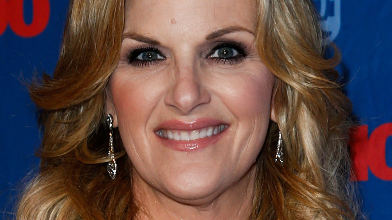 Trisha Yearwood with hair down and wide smile 