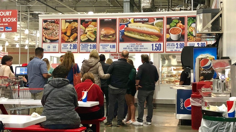 Costco customers in line at food court 