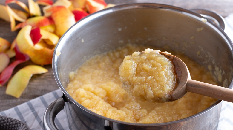 applesauce in pot and apples