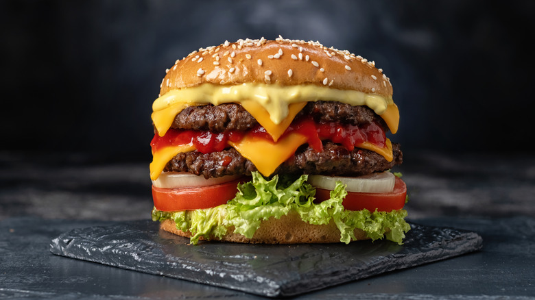 cheeseburger on a blackened plate