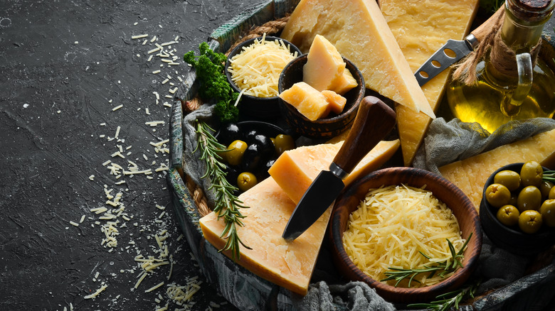 Cheese and olive platter with olive oil