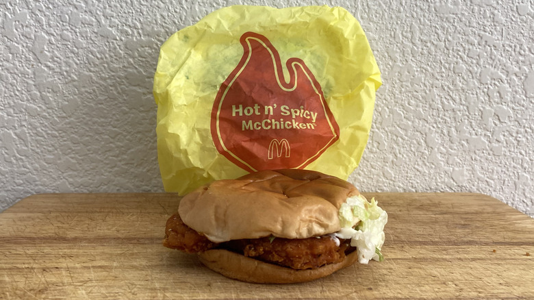 Hot 'n Spicy McChicken on cutting board with wrapper