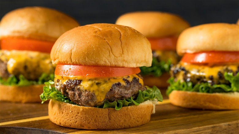 burgers with tomato, lettuce, cheese