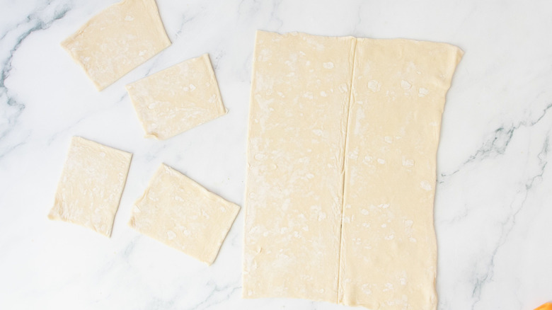 Puff pastry sheet with slices removed
