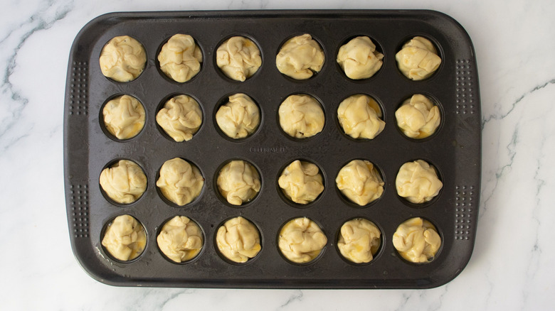 Enclosed pastry bites in muffin tin