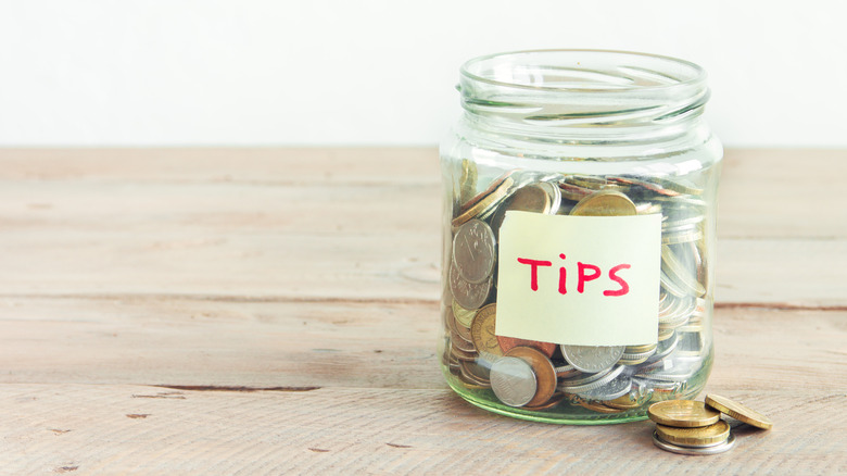 Tip jar full of change