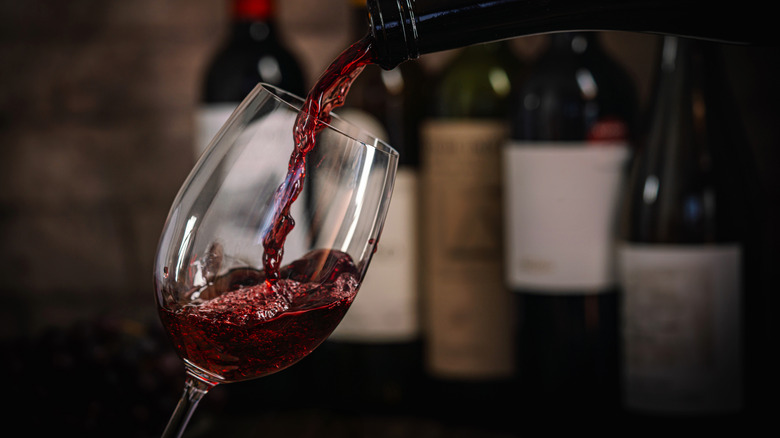 Pouring glass of red wine
