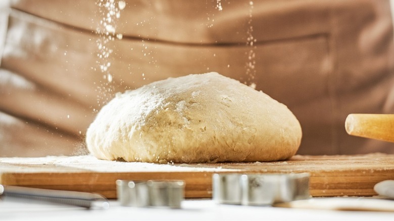 Bread dough on a cutting board
