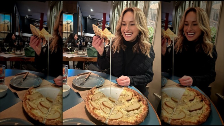 Giada De Laurentiis pulling pizza slice