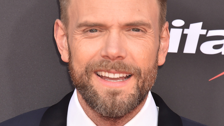 Joel McHale smiles 