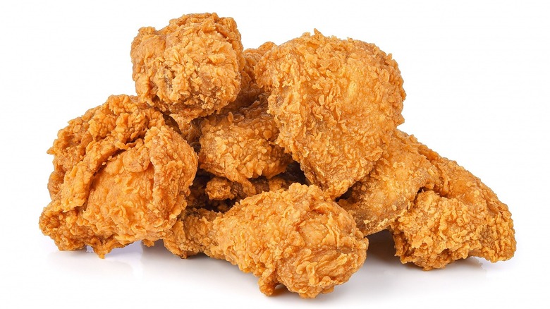 pile of fried chicken on white background
