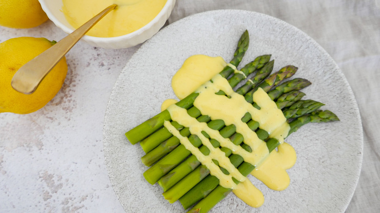 asparagus spears topped with Hollandaise sauce