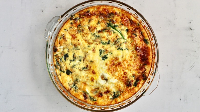 Spinach quiche in glass dish