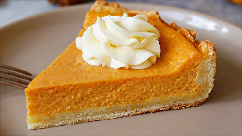 pumpkin pie slice with frosting