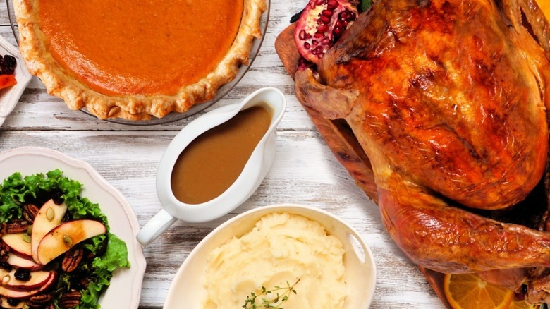 Gravy boat with pie and turkey