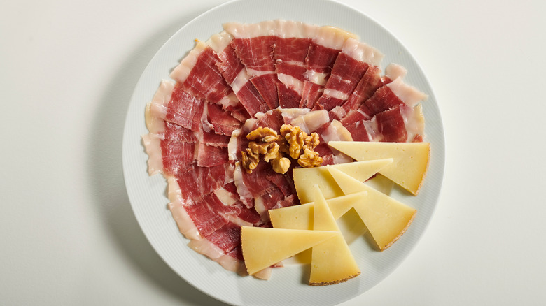 Plate of Iberico ham and Manchego cheese 