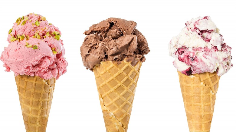 Ice Cream In A Series Of Cones With Different Flavors Background