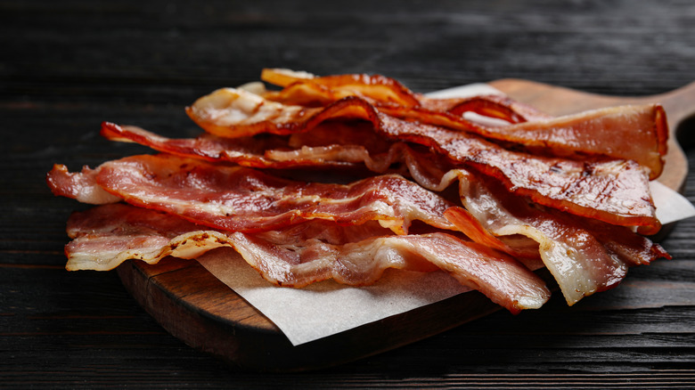 Bacon on wooden platter