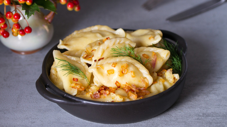 Pierogis in a black bowl