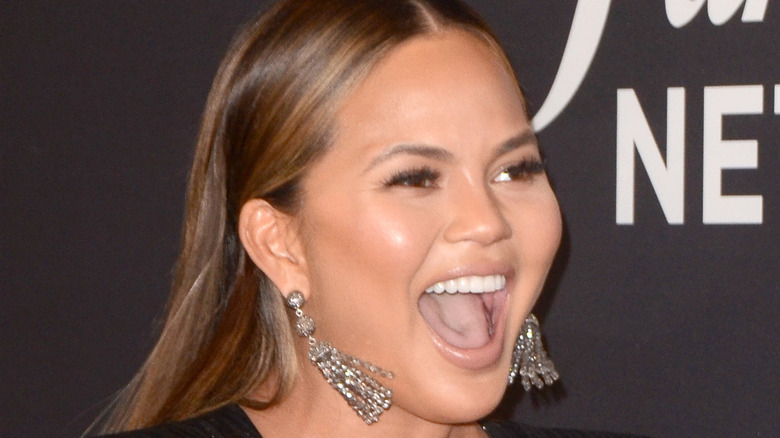 Chrissy Teigen looking happy 