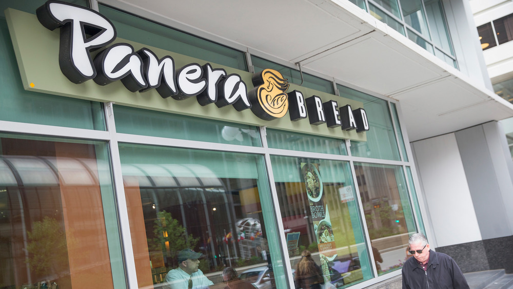 Panera Bread storefront with customers in the window