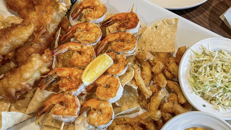 A seafood platter at Texas Roadhouse featuring friend catfish and shrimp.