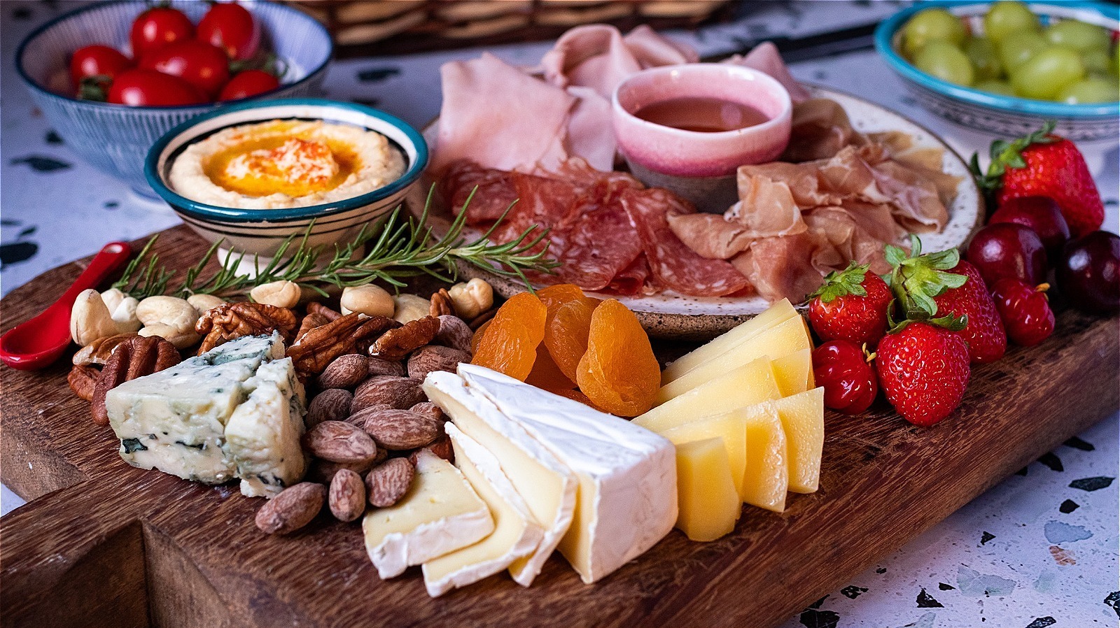 The Unsettling Origins Of The Charcuterie Board