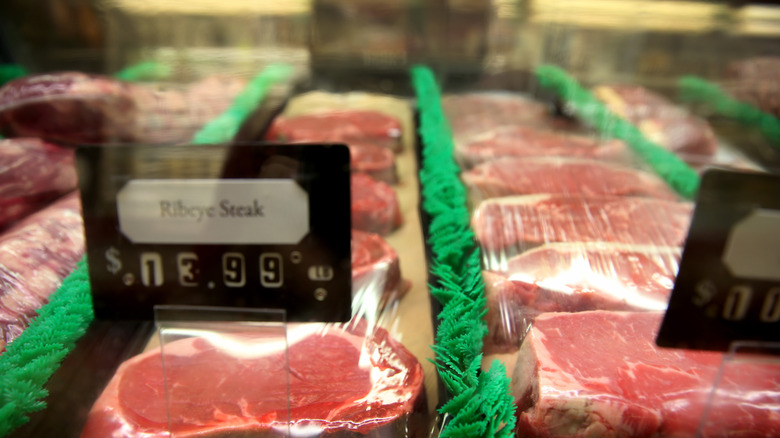 Raw meat in butcher's case