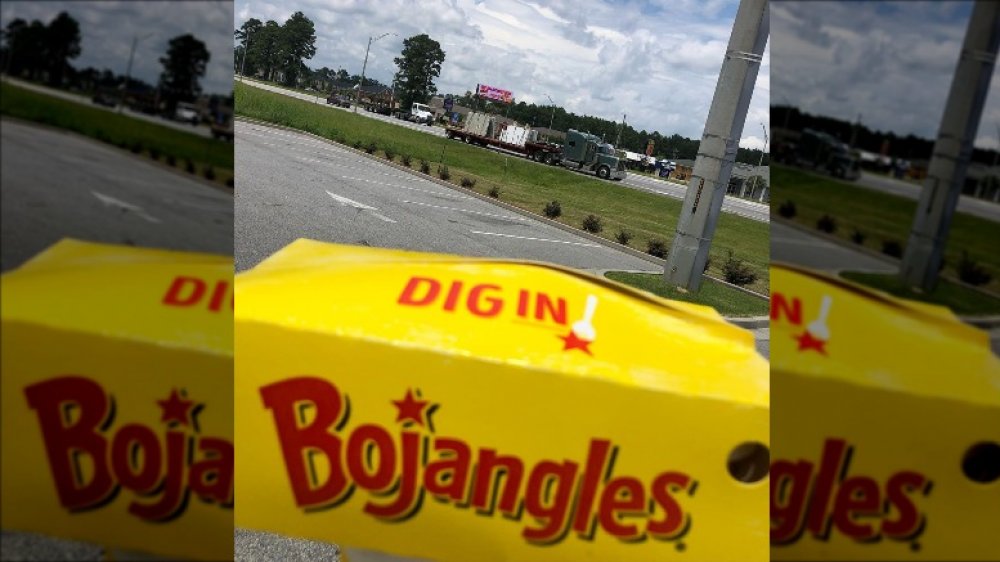 man finds money in Bojangles box