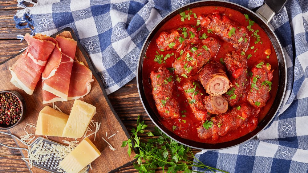 Braciole cooking in tomato sauce