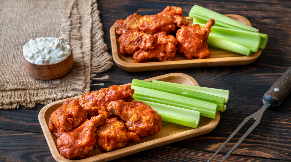 Buffalo wings with celery and blue cheese