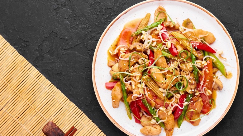 Chicken chop suey on white plate