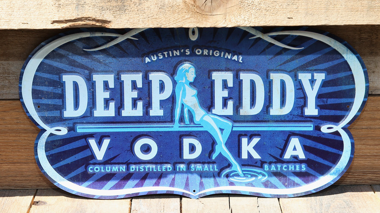 Deep Eddy Vodka sign on wood background