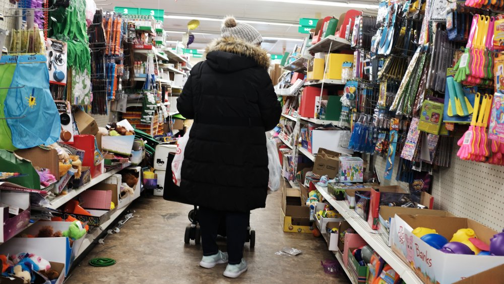 Woman shopping at a Dollar Tree