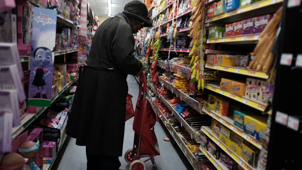 Woman shopping at a Dollar Tree