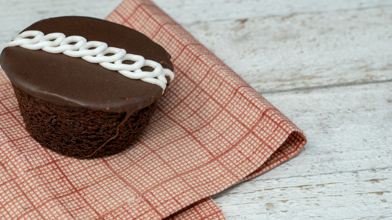 Hostess cupcake on checked towel