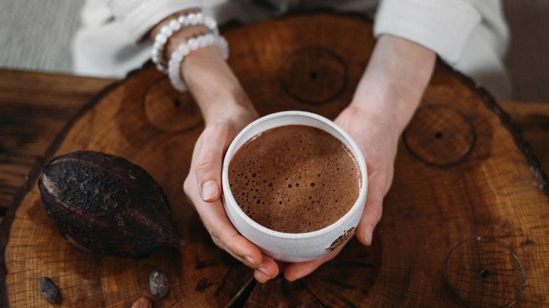 hands holding hot chocolate